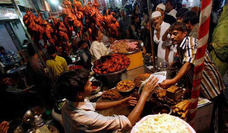 At least five civic bodies in Gujarat have announced that larris selling non-vegetarian food on the main roads would be banned | Reuters