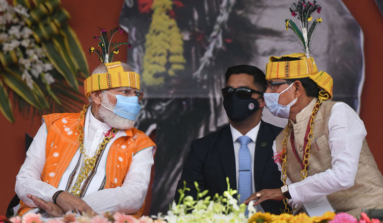 Prime Minister Narendra Modi with Madhya Pradesh Chief Minister Shivraj Singh Chouhan during Janjatiya Gaurav Diwas Maha Sammelan', in Bhopal on November 15 | PTI