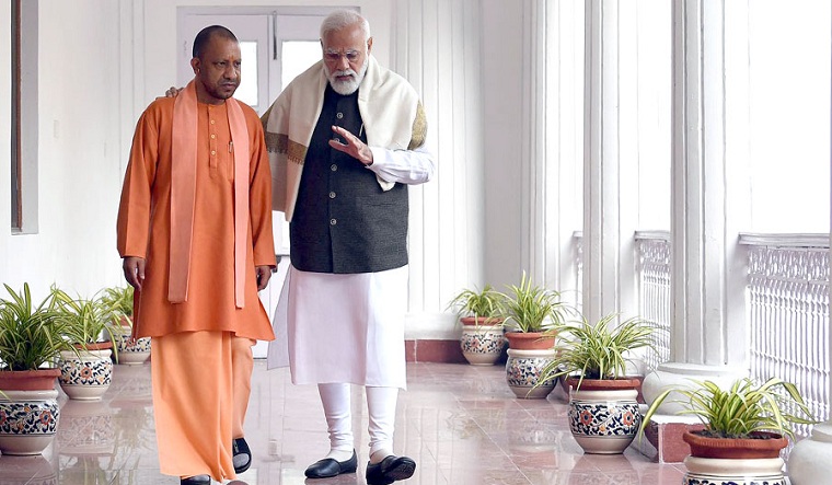 Prime Minister Narendra Modi taking a walk with Uttar Pradesh Chief Minister Yogi Adityanath | Twitter