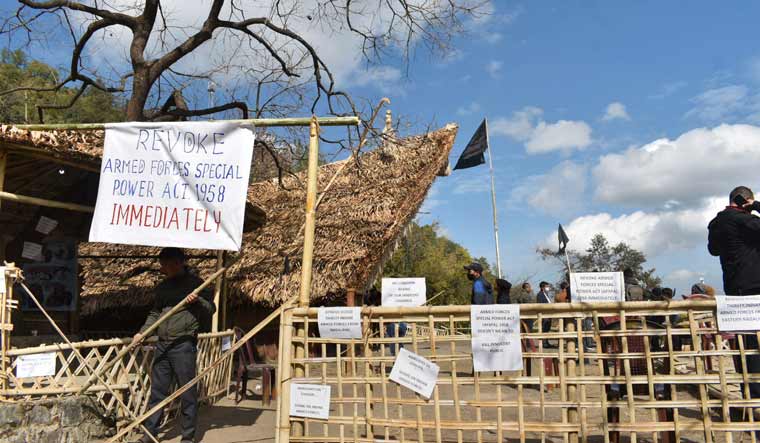 Placards and black flags at the Hornbill festival venue in solidarity with civilians killed in an anti-insurgency operation, in Kisama, Nagaland, Sunday, Dec. 5, 2021 | PTI