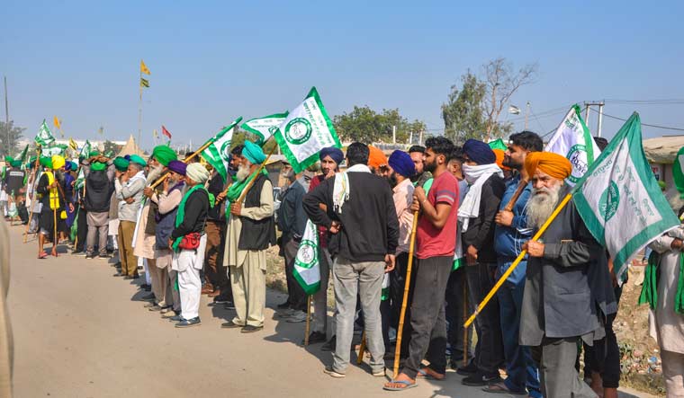 A file photo of farmers during their protest on GT Karnal road near the Singhu border | PTI