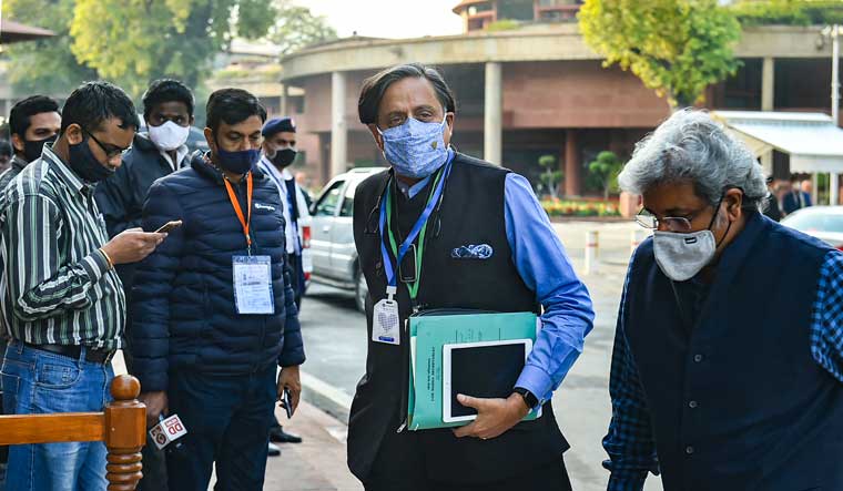 ongress MP Shashi Tharoor arrives at Parliament House, during the ongoing Budget Session | PTI