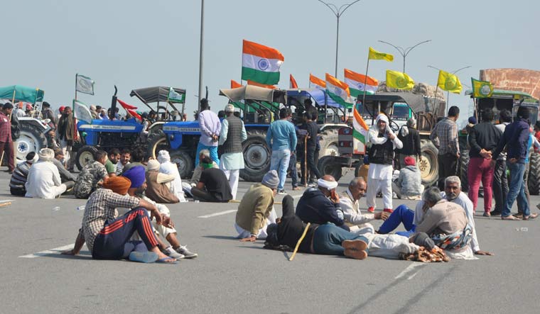 [File] Farmers block a road at Singhu border during their 'chakka jam' protest on February 6 |  PTI