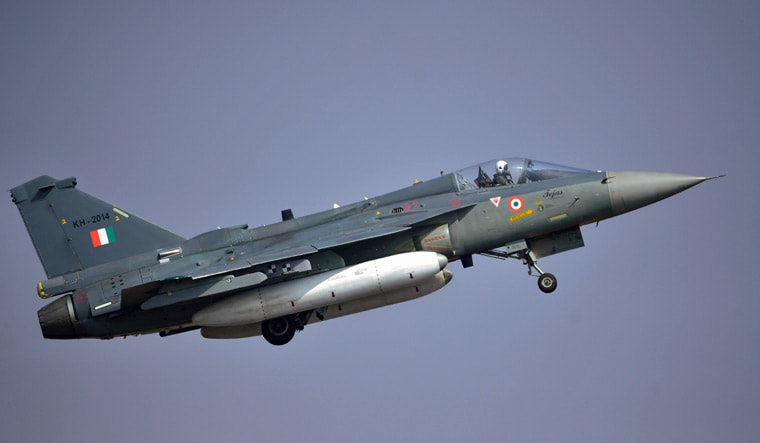 Bengaluru: Indian Air Force's Tejas aircraft performs during rehearsals for the Aero India 2021, at the Yelahanka air base in Bengaluru, Tuesday, Feb.2, 2021 | PTI Photo/Shailendra Bhojak