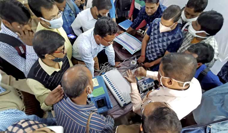 Experts demonstrate the working of EVM and VVPAT during a training programme ahead of the West Bengal Assembly elections 2021, at Suri in Birbhum district | PTI