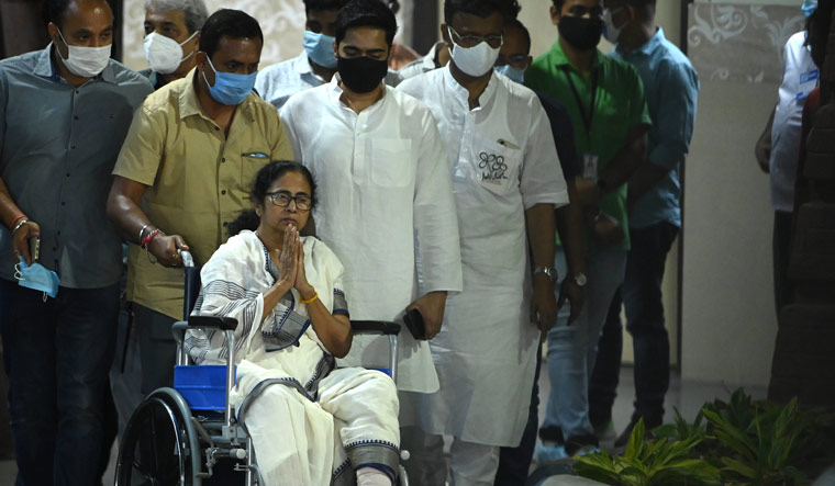 Mamata Banerjee discharged from hospital, leaves on a wheelchair - The Week