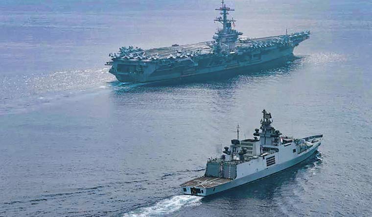 INS Shivalik participates in a Passage Exercise (PASSEX) with US Navy's USS Theodore Rosevelt Carrier Strike Group in the eastern Indian Ocean Region | Twitter/Indian Navy