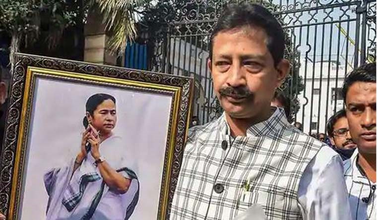 Rajib Banerjee with a portrait of West Bengal CM Mamata Banerjee | PTI