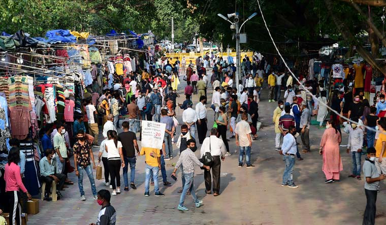 People crowd at Janpath market during COVID-19 lockdown relaxation, in New Delhi | PTI