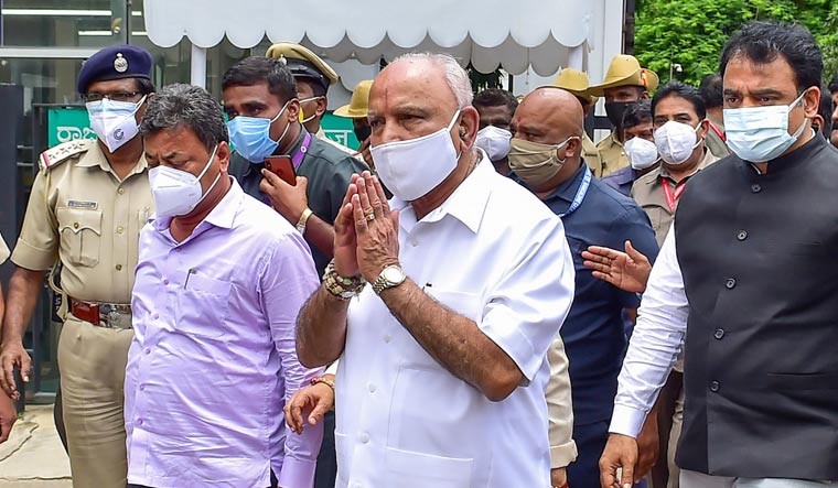 Karnataka Chief Minister B.S. Yediyurappa comes out of Raj Bhavan after he resigned from CM post | PTI