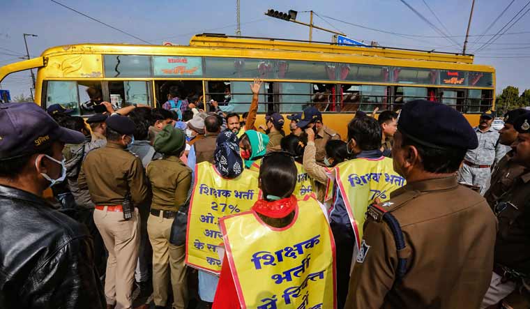 Activists of OBC Mahasabha being detained by police during a protest  outside CM's residence in Bhopal | PTI