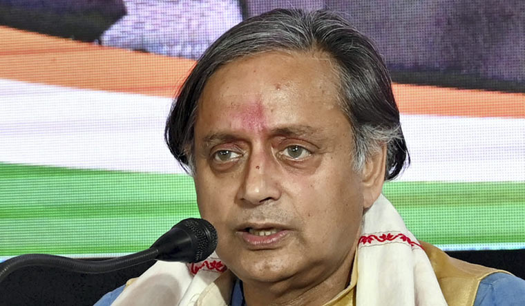 Congress presidential candidate Shashi Tharoor addresses a press conference at Rajiv Bhavan, in Guwahati | PTI