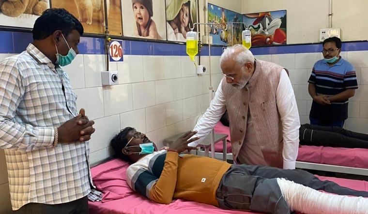 Prime Minister Narendra Modi visits victims of the bridge collapse accident at Morbi civil hospital 