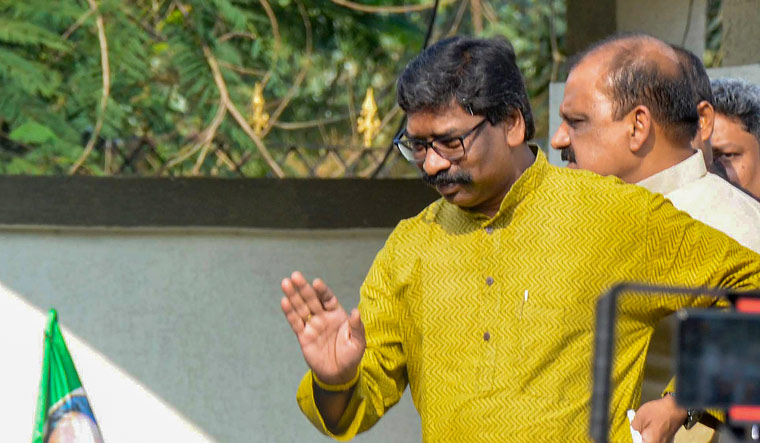 Jharkhand Chief Minister Hemant Soren arrives to address JMM workers and supporters outside his residence in Ranchi | PTI