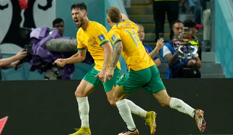 Australia's Mathew Leckie, left, celebrates after scoring his side's goal against Denmark | AP