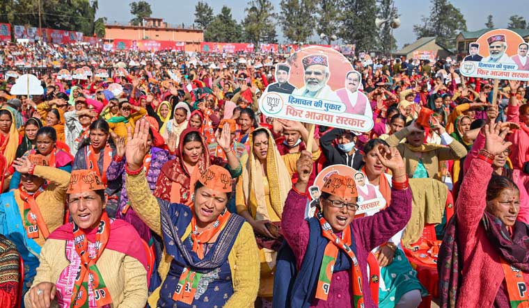 BJP supporters attend a rally by Prime Minister Narendra Modi, at Sundar Nagar in Mandi district | PTI