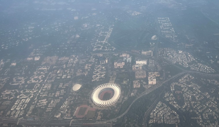 An aerial view of residential buildings shrouded in smog in Delhi | PTI