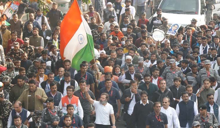 Rahul Gandhi waves at supporters during his Bharat Jodo Yatra in Delhi | Arvidn Jain