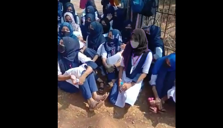 Muslim students in various colleges in Karnataka have been protesting against the ban on Hijab on campuses | Screengrab