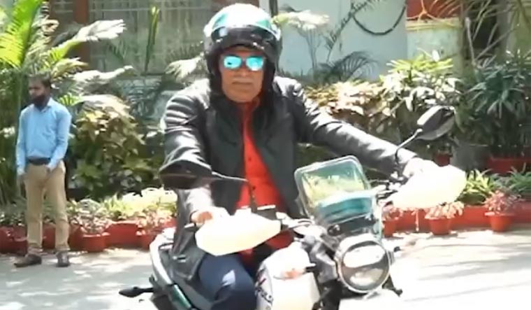 A video grab of Chhattisgarh CM Bhupesh Baghel riding a bike at CM House | via Twitter