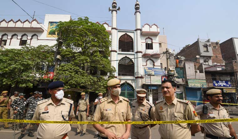 Security personnel keep vigil after clashes broke out between two communities at Jahangirpuri | PTI