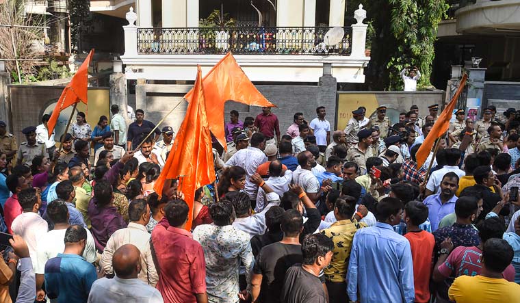 Shiv Sena activists protest outside Ravi Rana and Navneet Kaur's residence | PTI