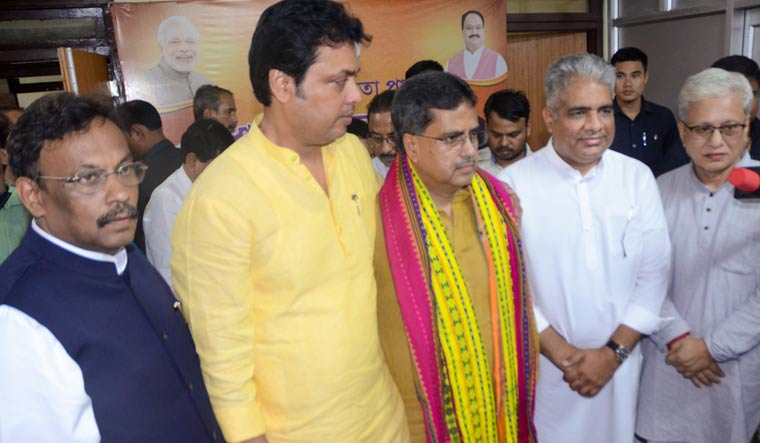 Newly appointed Tripura Chief Minister Manik Saha with former chief minister Biplab Kumar Deb and Union Minister Bhupender Yadav | PTI