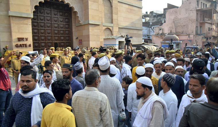Members of the Muslim community gather at the site during the survey of the Gyanvapi Masjid complex and Shringar Gauri Temple, in Varanasi | PTI