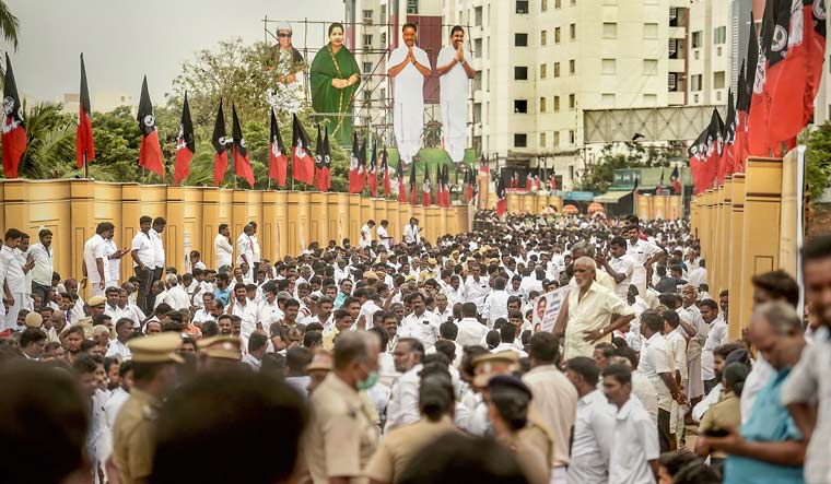AIADMK supporters assemble in front of the venue of party's General Council Meeting, in Chennai on Thursday | PTI