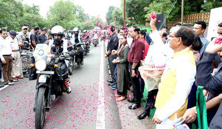 Chief Minister Shivraj Singh Chouhan flags off a bike rally from Bhopal to Bhabra, the birthplace of freedom fighter Chandrashekhar Azad | PTI