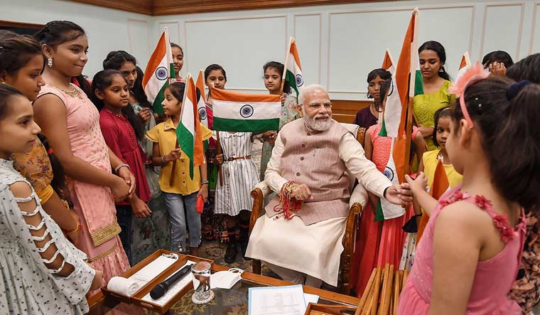 Prime Minister Narendra Modi celebrates Raksha Bandhan festival with children of PMO staff | PTI