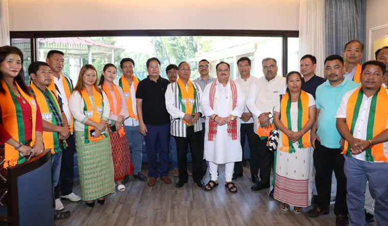 Techi Kaso and other leaders after joing BJP in the presence of J.P. Nadda