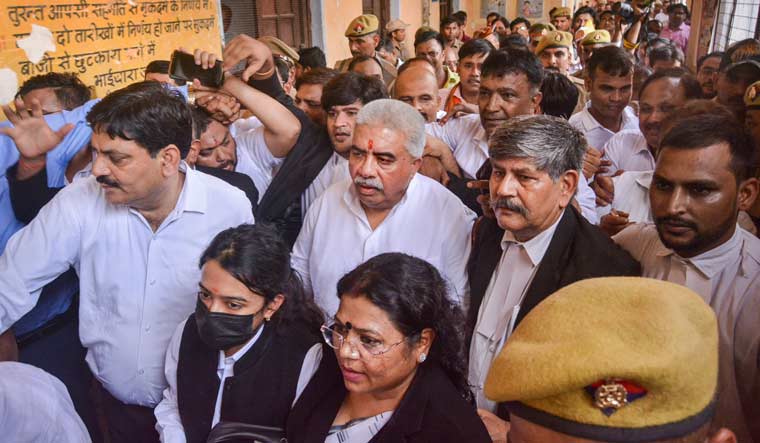 UP minister Rakesh Sachan with his lawyers at the Kanpur court | PTI