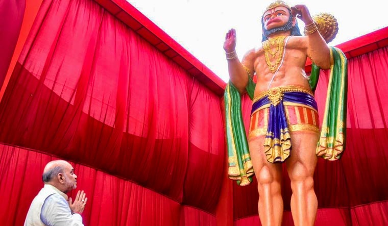 Union Home Minister Amit Shah during the unveiling ceremony of a 16-feet statue of Lord Hanuman at Somnath town in Gujarat | PTI