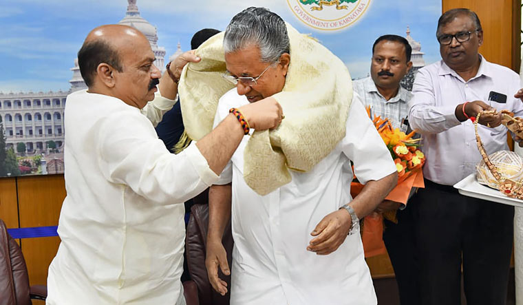 Karnataka Chief Minister Basavaraj Bommai felicitates Kerala Chief Minister Pinarayi Vijayan during their meeting, in Bengaluru| PTI