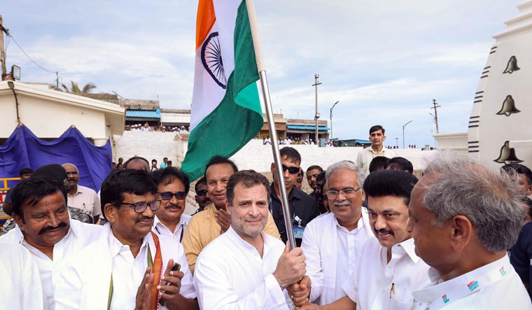 Tamil Nadu CM MK Stalin, Rajasthan CM Ashok Gehlot and Chhattisgarh CM Bhupesh Baghel handing over the national flag to Congress leader Rahul Gandhi | PTI