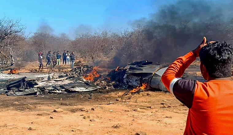 Wreckage of planes after a Su-30MKI and a Mirage 2000 fighter planes crashed during an exercise, in Morena district of Madhya Pradesh | PTI