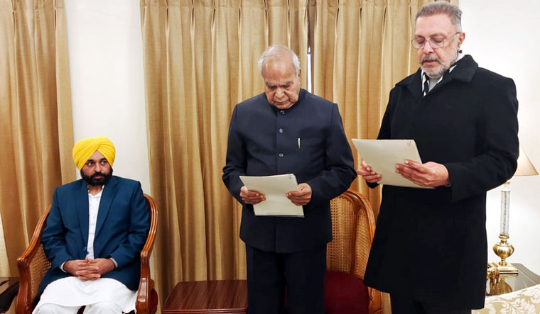 Punjab Governor Banwarilal Purohit administers oath to AAP leader Balbir Singh as the new cabinet minister | PTI