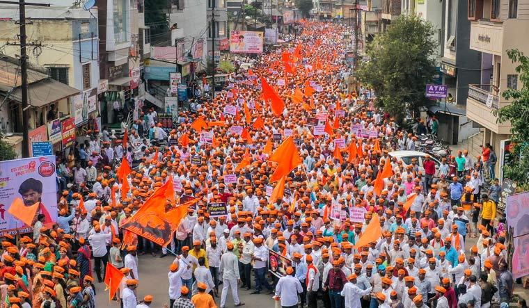 Activists of Maratha Kranti Morcha and Sakal Maratha Samaj during a march to press for Maratha reservation, in Karad on Monday | PTI