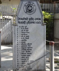 A plaque displaying the names of employees who died on the night of the Bhopal gas tragedy, at the Bhopal railway station