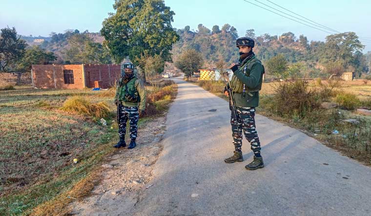 Security personnel stand guard during an encounter with terrorists, at Baji Maal area of Rajouri district | PTI