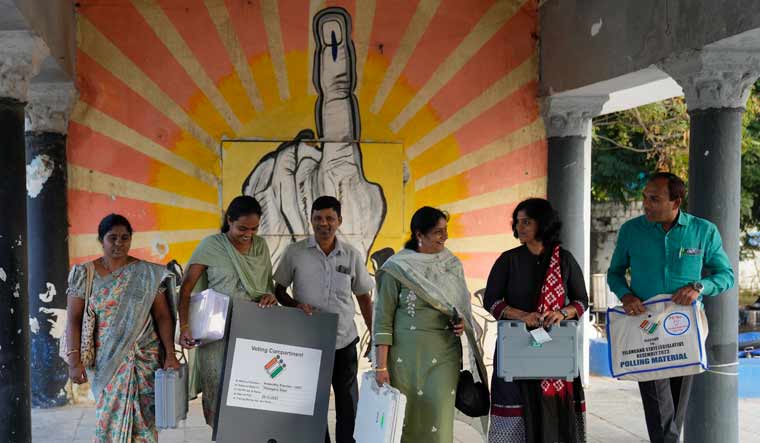Polling officers leave for their respective polling booths in Hyderabad | AP
