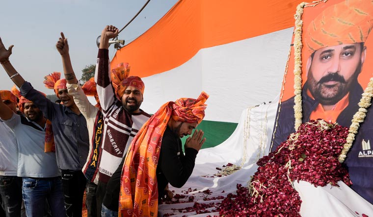 People from the Rajput community pay tribute to Shree Rajput Karni Sena's Sukhdev Singh Gogamedi during a protest against his killing in Delhi | PTI