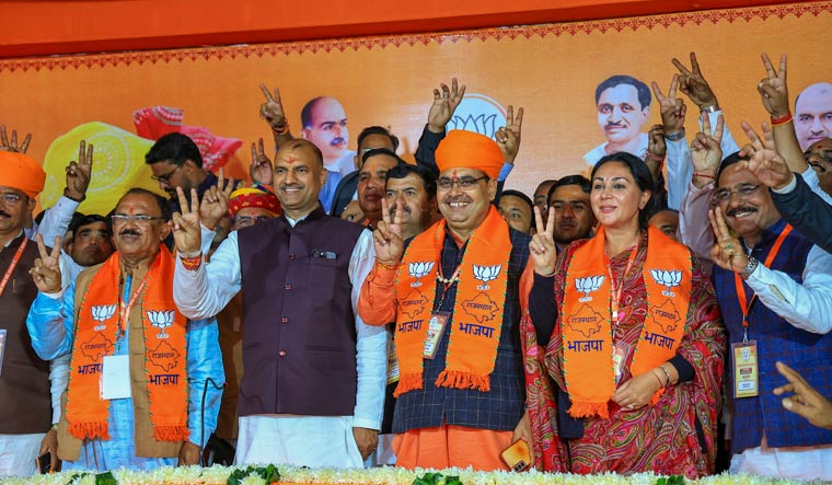 Newly-elected Rajasthan Chief Minister Bhajan Lal Sharma with his deputies Diya Kumari and Prem Chand Bairwa, newly-elected State Assembly Speaker Vasudev Devnani and Rajasthan BJP President C.P. Joshi during BJP Legislature Party meeting, in Jaipur | PTI