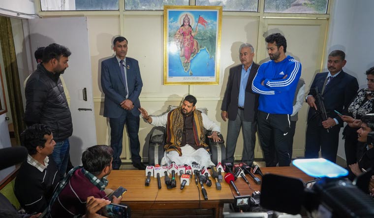 BJP MP Brij Bhushan Sharan Singh addresses the media after the Sports Ministry suspended the newly-elected Wrestling Federation of India body | PTI