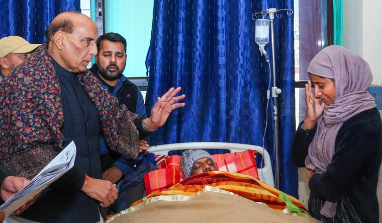Defence Minister Rajnath Singh visits a civilian allegedly injured in military custody, at Government Medical College in Rajouri | PTI