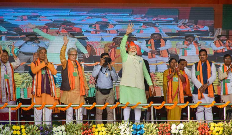 Prime Minister Narendra Modi with Tripura Chief Minister Manik Saha, BJP MP Pratima Bhoumik and other leaders during a party rally at Radhakishorepur in Gomati district | PTI