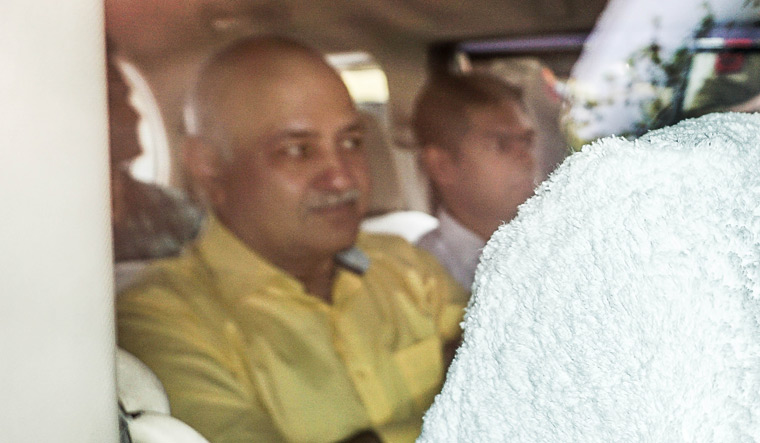 [File] Manish Sisodia being taken to Rouse Avenue court by CBI officials | PTI