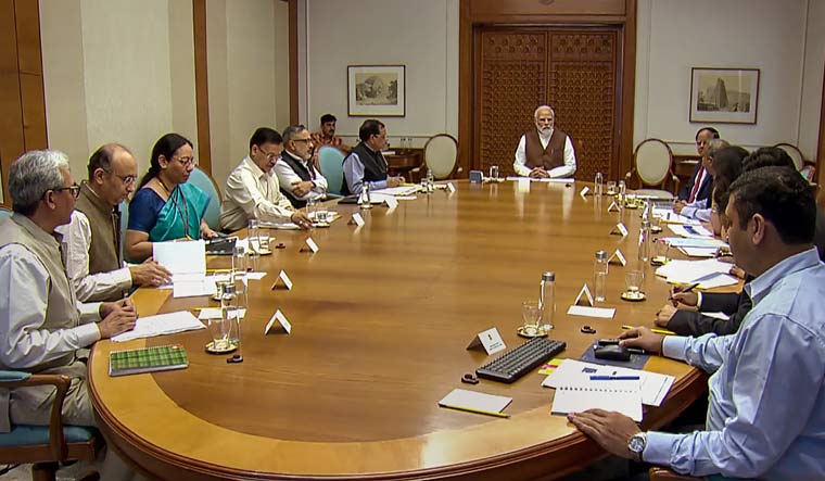 Prime Minister Narendra Modi chairs a high-level meeting on Covid-19 | PTI