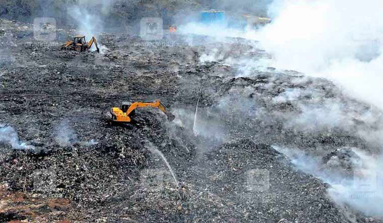 Firefighters trying to extinguish the blaze at Brahmapuram waste plant in Kochi | Manorama